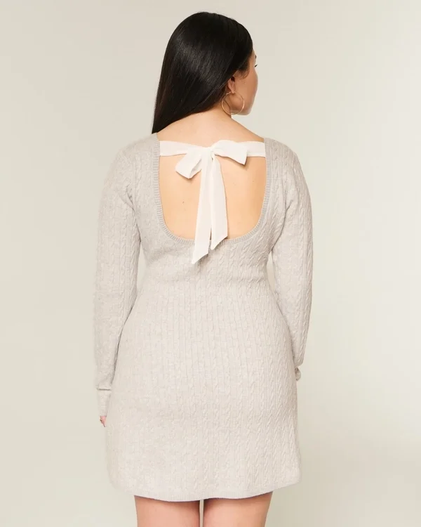 Babydoll-Strickminikleid mit Bindeband Babydoll-Strickminikleid mit Bindeband