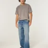 Baggy-Jeans mit Alien-Grafik in mittlerer Waschung Baggy-Jeans mit Alien-Grafik in mittlerer Waschung