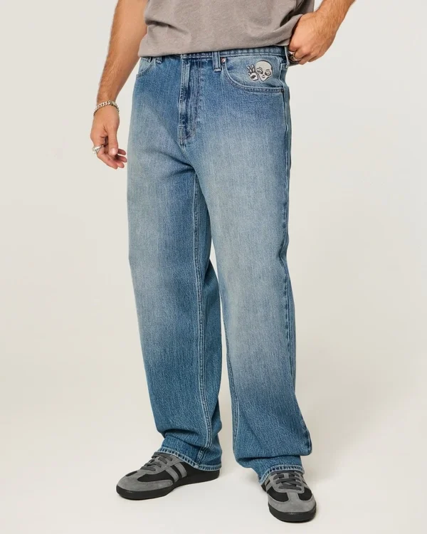 Baggy-Jeans mit Alien-Grafik in mittlerer Waschung Baggy-Jeans mit Alien-Grafik in mittlerer Waschung