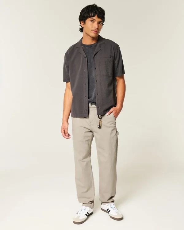 Bestickte, locker sitzende Malerjeans Bestickte, locker sitzende Malerjeans