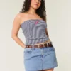 Curvy Low-Rise Mini-Skort aus mittelblauem Denim
