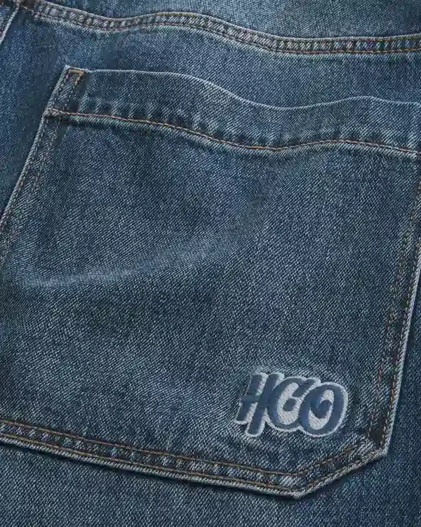 Dunkel gewaschene Jeans mit Logo-Stickerei Super Baggy Jeans Dunkel gewaschene Jeans mit Logo-Stickerei Super Baggy Jeans