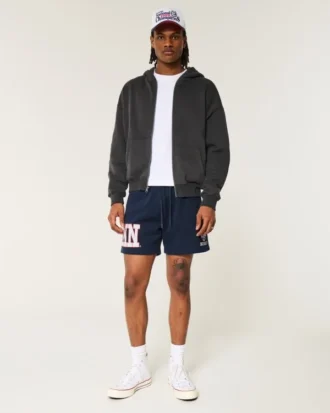 Fleece-Shorts mit UConn Huskies-Grafik, mittellang