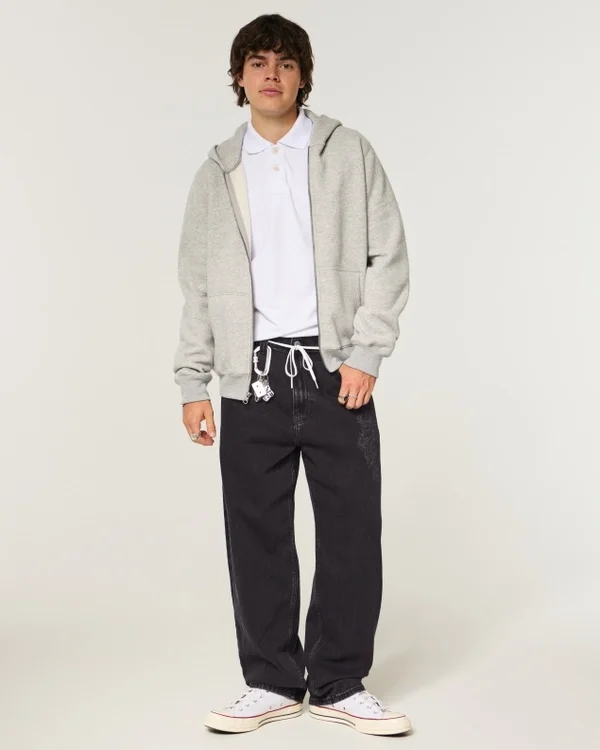 Gewaschene schwarze Baggy-Jeans mit Drachenmotiv Gewaschene schwarze Baggy-Jeans mit Drachenmotiv