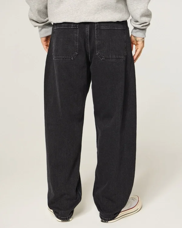 Gewaschene schwarze Baggy-Jeans mit Drachenmotiv Gewaschene schwarze Baggy-Jeans mit Drachenmotiv