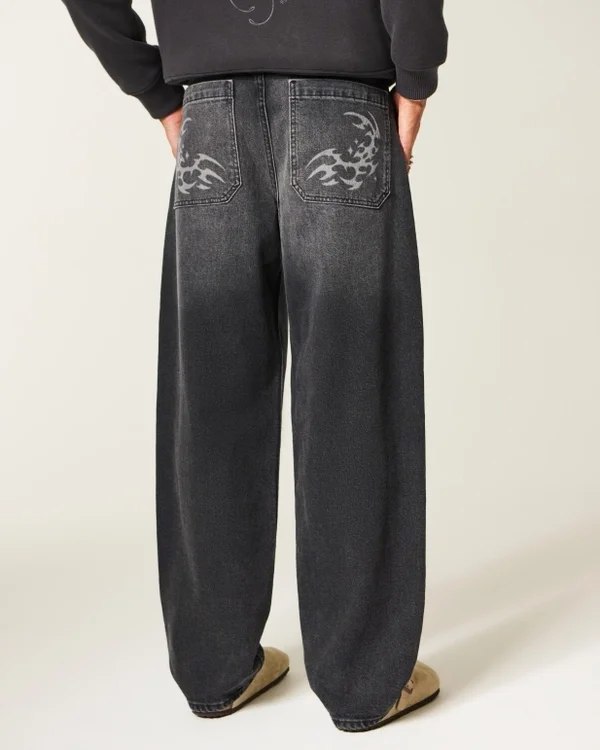 Gewaschene schwarze Baggy-Jeans mit Grafik Gewaschene schwarze Baggy-Jeans mit Grafik
