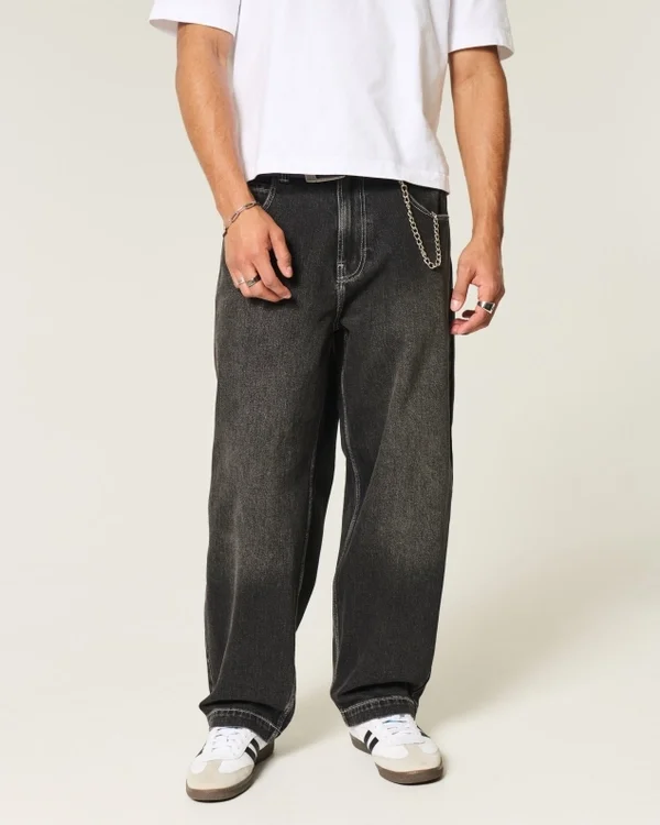 Gewaschene schwarze Baggy-Jeans mit Schlangenstickerei Gewaschene schwarze Baggy-Jeans mit Schlangenstickerei