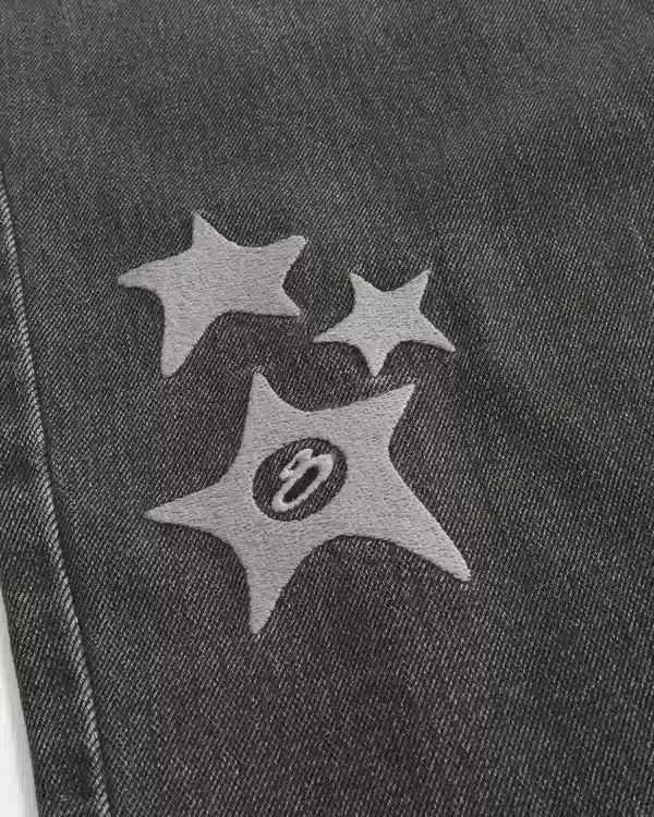 Gewaschene schwarze Baggy-Jeans mit Stern-Grafik Gewaschene schwarze Baggy-Jeans mit Stern-Grafik