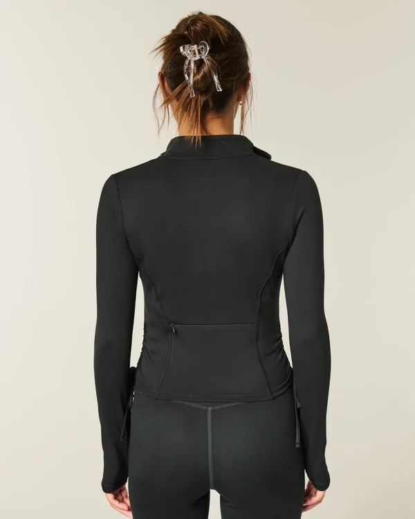 Gilly Hicks Active Recharge Jacke mit seitlichem Bindegürtel und Reißverschluss Gilly Hicks Active Recharge Jacke mit seitlichem Bindegürtel und Reißverschluss