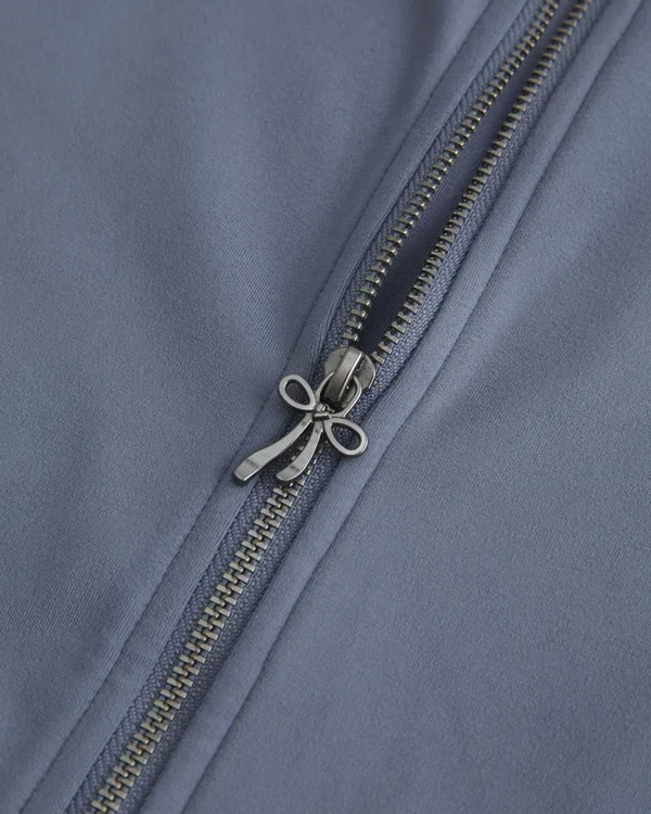 Gilly Hicks Active Recharge Jacke mit seitlichem Bindegürtel und Reißverschluss Gilly Hicks Active Recharge Jacke mit seitlichem Bindegürtel und Reißverschluss