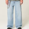 Hellblaue Super-Baggy-Jeans mit Astronauten-Grafik Hellblaue Super-Baggy-Jeans mit Astronauten-Grafik