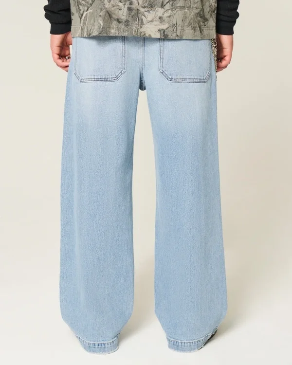 Hellblaue Super-Baggy-Jeans mit Astronauten-Grafik Hellblaue Super-Baggy-Jeans mit Astronauten-Grafik