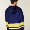 Hockey-Sweatshirt mit Grafik der University of Michigan Wolverines Hockey-Sweatshirt mit Grafik der University of Michigan Wolverines