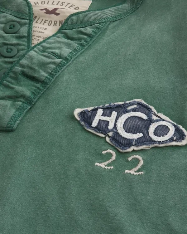 Holiday Vault Release Logo Graphic Henley Holiday Vault Release Logo Graphic Henley