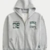 Kastenförmiger Hoodie mit Reißverschluss und Grafik der Michigan State University Spartans