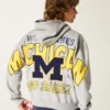 Kastiger Hoodie mit Reißverschluss und Grafik der University of Michigan Wolverines Kastiger Hoodie mit Reißverschluss und Grafik der University of Michigan Wolverines