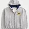 Kastiger Hoodie mit Reißverschluss und Grafik der University of Michigan Wolverines Kastiger Hoodie mit Reißverschluss und Grafik der University of Michigan Wolverines