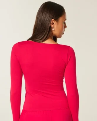 Langärmliges Baby-T-Shirt aus nahtlosem Stoff mit quadratischem Ausschnitt Langärmliges Baby-T-Shirt aus nahtlosem Stoff mit quadratischem Ausschnitt