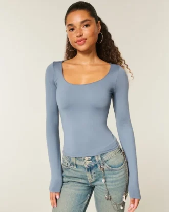 Langärmliges Baby-T-Shirt aus nahtlosem Stoff mit Rundhalsausschnitt Langärmliges Baby-T-Shirt aus nahtlosem Stoff mit Rundhalsausschnitt