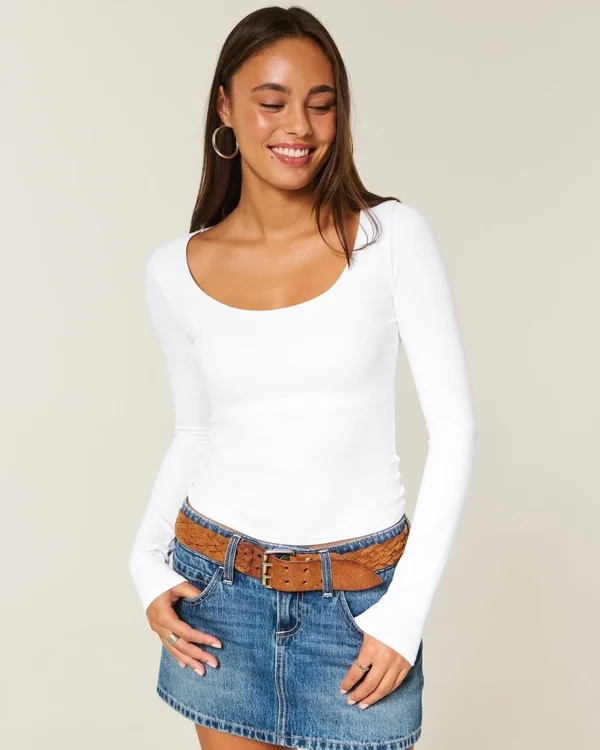 Langärmliges Baby-T-Shirt aus nahtlosem Stoff mit Rundhalsausschnitt Langärmliges Baby-T-Shirt aus nahtlosem Stoff mit Rundhalsausschnitt