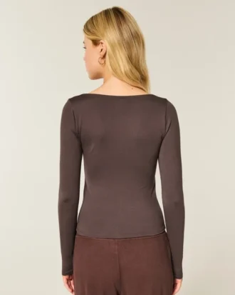 Langärmliges Baby-T-Shirt aus nahtlosem Stoff mit Rundhalsausschnitt Langärmliges Baby-T-Shirt aus nahtlosem Stoff mit Rundhalsausschnitt