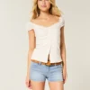 Low-Rise Light Wash Denim Shortie Shorts Low-Rise Light Wash Denim Shortie Shorts