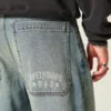 Medium Wash Hollywood Graphic Skater Baggy Jeans Medium Wash Hollywood Graphic Skater Baggy Jeans