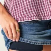 Mini-Skort aus Denim mit niedriger Leibhöhe und Nieten Mini-Skort aus Denim mit niedriger Leibhöhe und Nieten