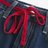 Minirock aus Denim mit niedriger Taille und Bindeband Minirock aus Denim mit niedriger Taille und Bindeband
