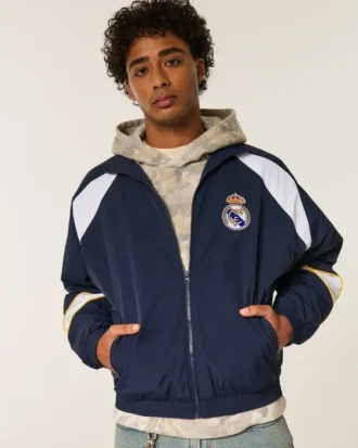 Mit Fleece gefütterte Real Madrid CF Grafik-Trainingsjacke Mit Fleece gefütterte Real Madrid CF Grafik-Trainingsjacke