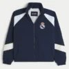 Mit Fleece gefütterte Real Madrid CF Grafik-Trainingsjacke Mit Fleece gefütterte Real Madrid CF Grafik-Trainingsjacke