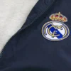 Mit Fleece gefütterte Real Madrid CF Grafik-Trainingsjacke Mit Fleece gefütterte Real Madrid CF Grafik-Trainingsjacke