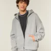Rechteckig geschnittener Hoodie mit Reißverschluss und Nieten