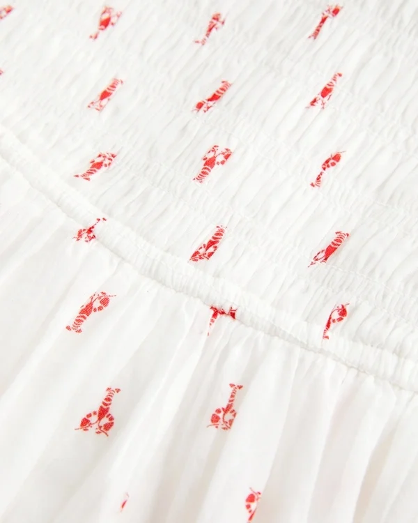 Trägerloses Minikleid mit gesmoktem Oberteil Trägerloses Minikleid mit gesmoktem Oberteil