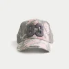 Trucker-Kappe mit rosa Camouflage-Grafik