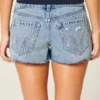 Ultra-niedrige Mini-Shorts aus besticktem Denim Ultra-niedrige Mini-Shorts aus besticktem Denim