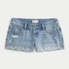 Ultra-niedrige Mini-Shorts aus besticktem Denim Ultra-niedrige Mini-Shorts aus besticktem Denim