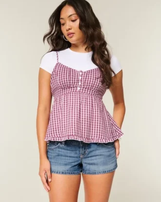 Ultra-niedrige Mini-Shorts aus mittelblauem Denim im Used-Look