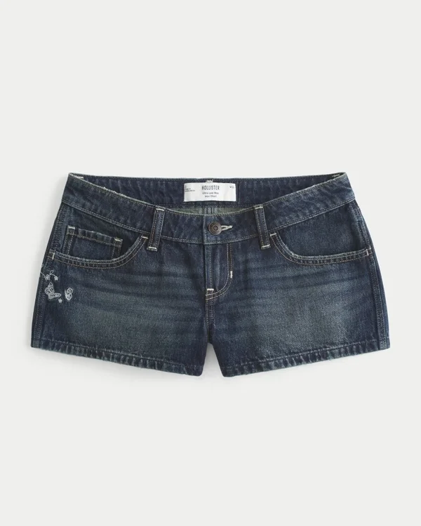 Ultra-niedrige Passform, dunkel gewaschene Denim-Minishorts mit Schmetterlingsstickerei Ultra-niedrige Passform, dunkel gewaschene Denim-Minishorts mit Schmetterlingsstickerei