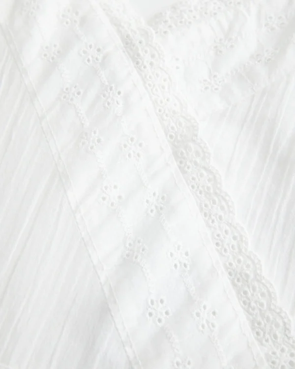 V-Ausschnitt-Strampler mit seitlichen Bändern V-Ausschnitt-Strampler mit seitlichen Bändern