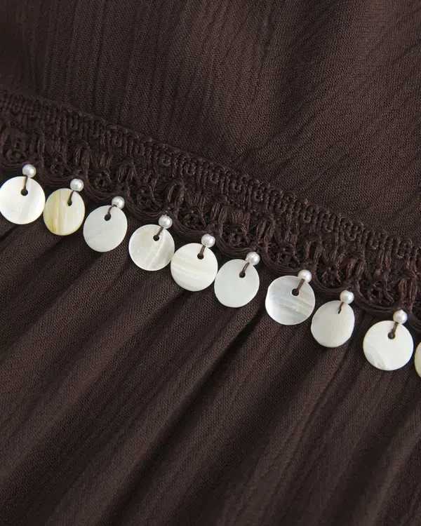 Verziertes Neckholder-Top mit V-Ausschnitt Verziertes Neckholder-Top mit V-Ausschnitt