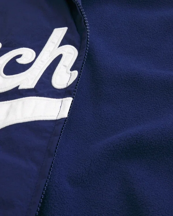 Windjacke mit Grafik der University of Michigan Wolverines Windjacke mit Grafik der University of Michigan Wolverines