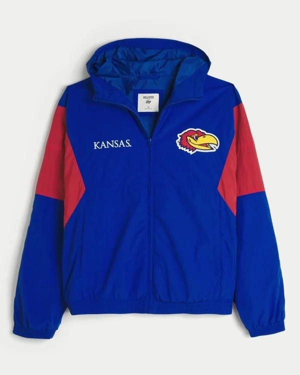 Windjacke mit Kapuze und Grafik der University of Kansas Jayhawks Windjacke mit Kapuze und Grafik der University of Kansas Jayhawks